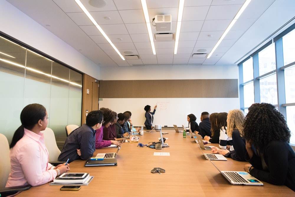 Leadership team around a boardroom table
