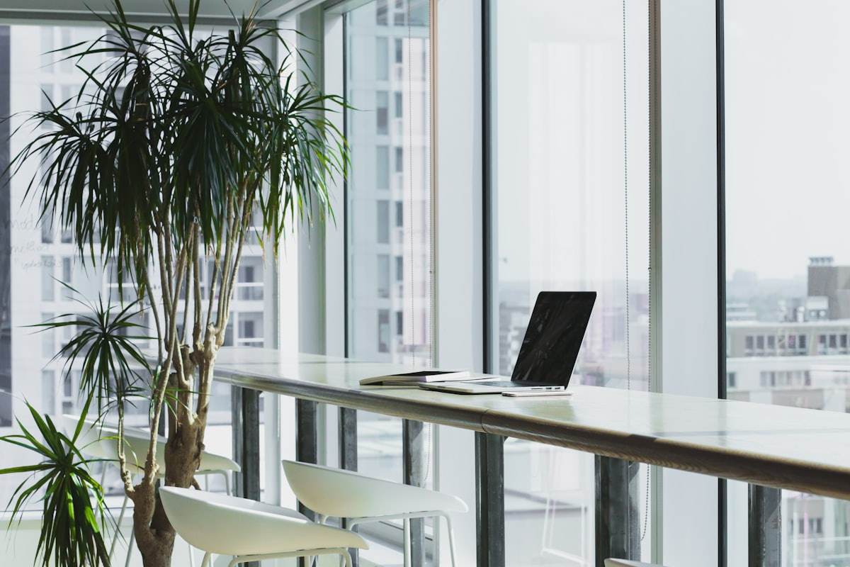Desk by a window overlooking the city