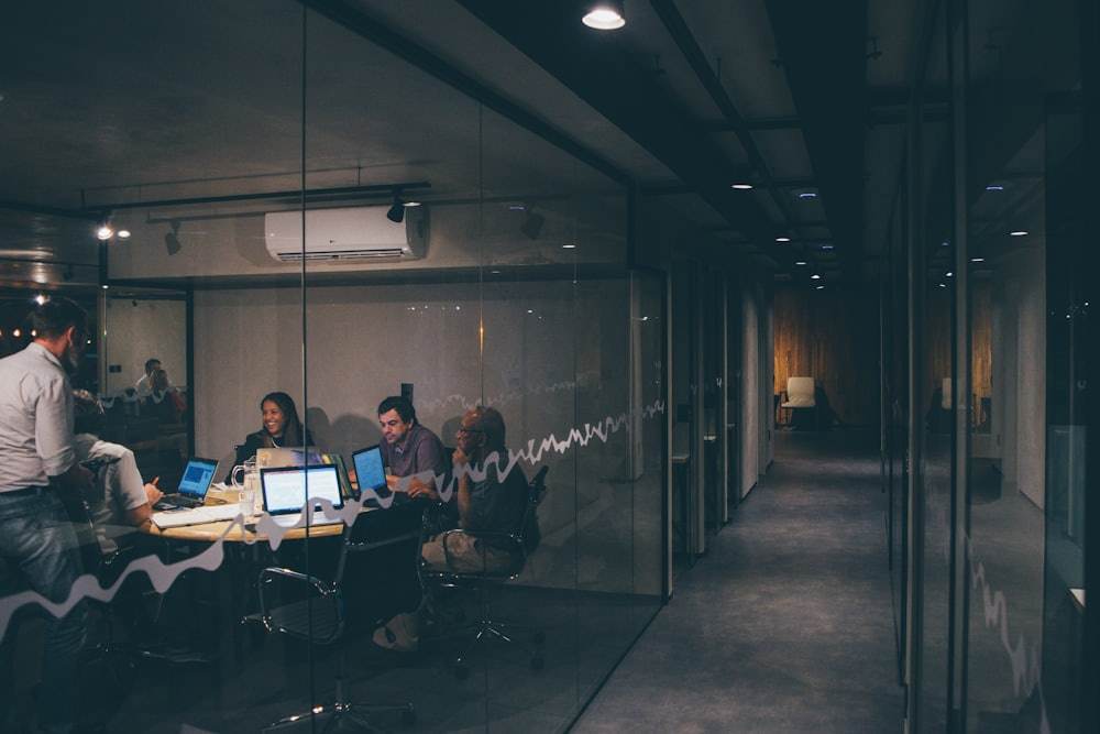 A working session behind glass in a city office