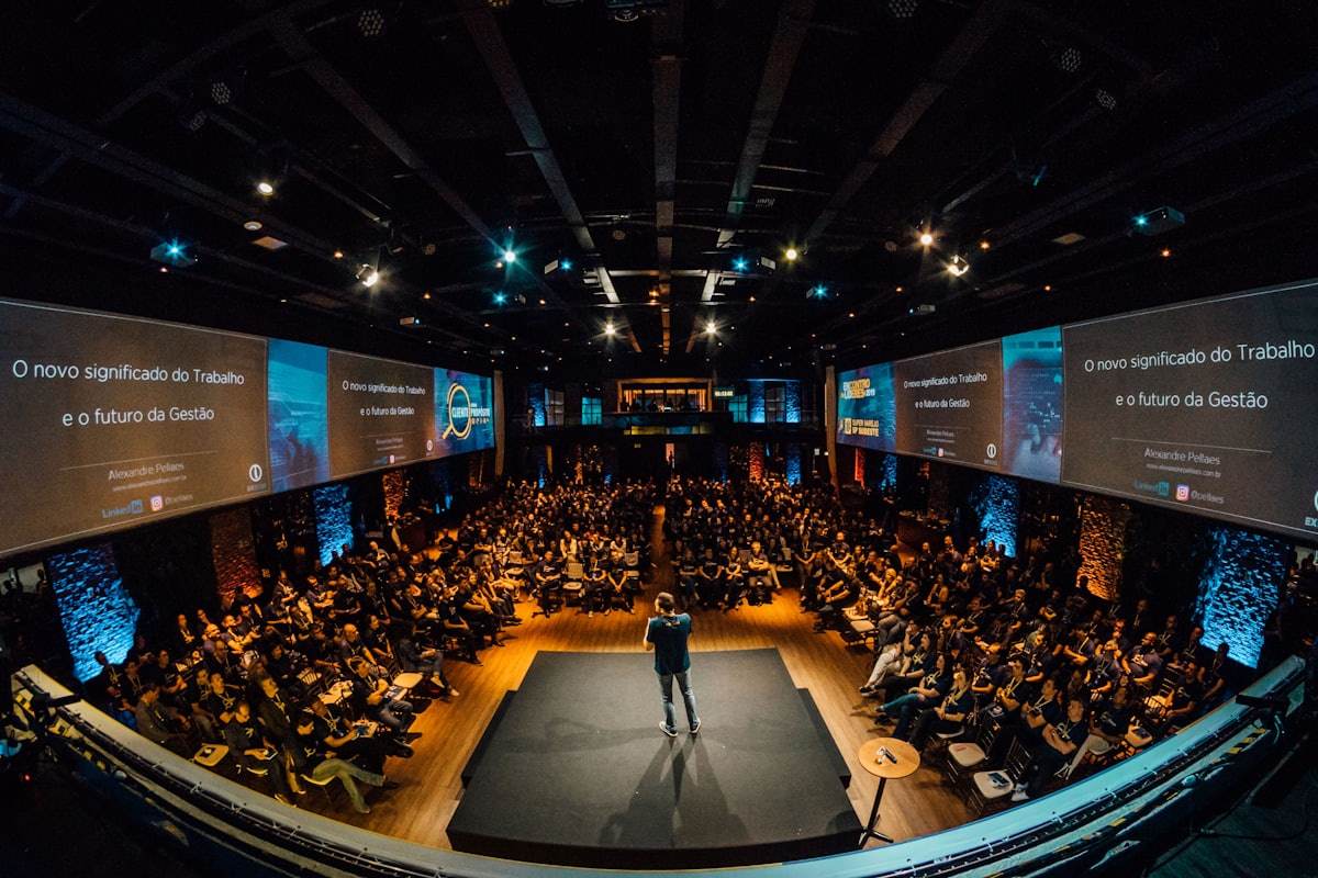 Speaker addressing a large audience